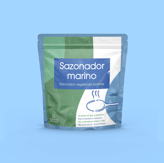 Cara delantera del packaging del producto Sazonador Marino de Marisma Biomed. Fondo azul.