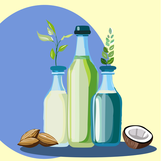 Tres botellas de leche vegetal de distintos tipos, al lado unas almendras y un coco.